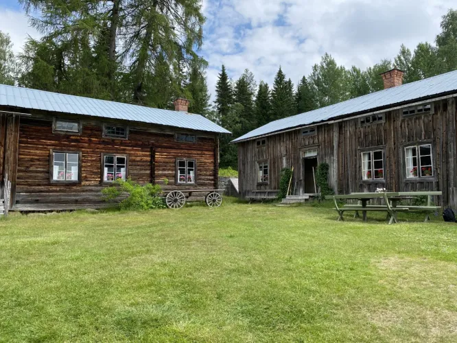 Clour photo - exterior of the farmhouse at summer season.